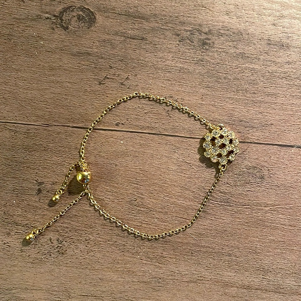 Rhinestones/golden clasp bracelet